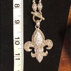 Silver necklace with fleur de lis
